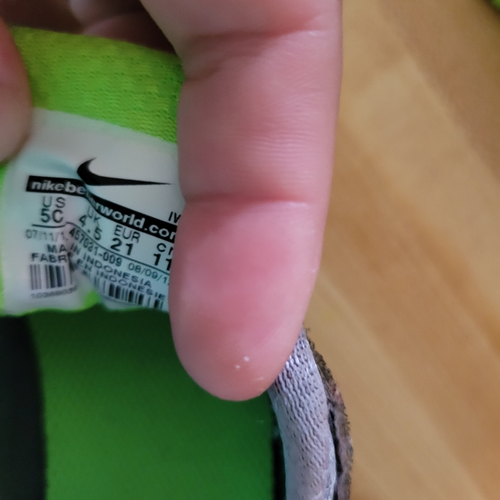 Grey and green Nike shoes